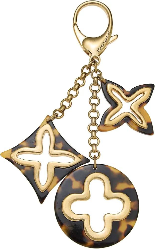 Authentic Louis Vuitton pre-loved gold tortoiseshell Insolence bag charm in timeless luxury design